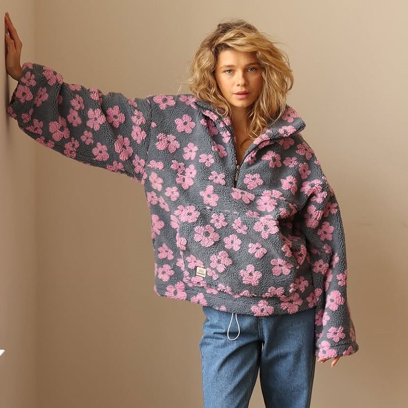 Lieve | Oversized teddyfleecejas met bloemenprint en halve ritssluiting