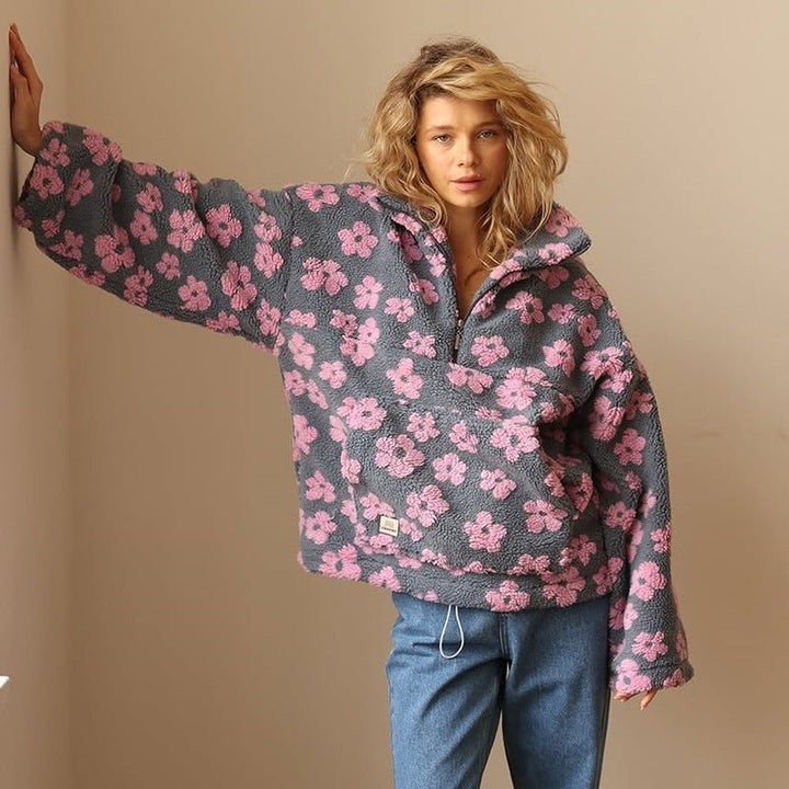 Lieve | Oversized teddyfleecejas met bloemenprint en halve ritssluiting