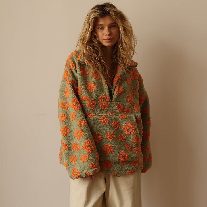 Lieve | Oversized teddyfleecejas met bloemenprint en halve ritssluiting