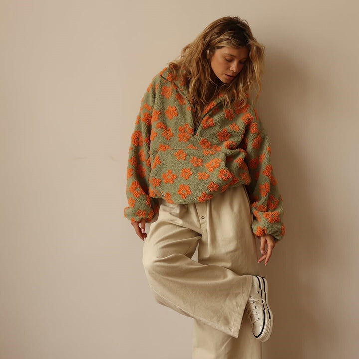 Lieve | Oversized teddyfleecejas met bloemenprint en halve ritssluiting