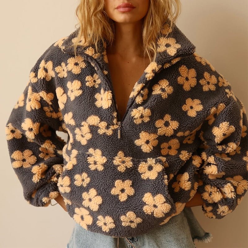 Lieve | Oversized teddyfleecejas met bloemenprint en halve ritssluiting