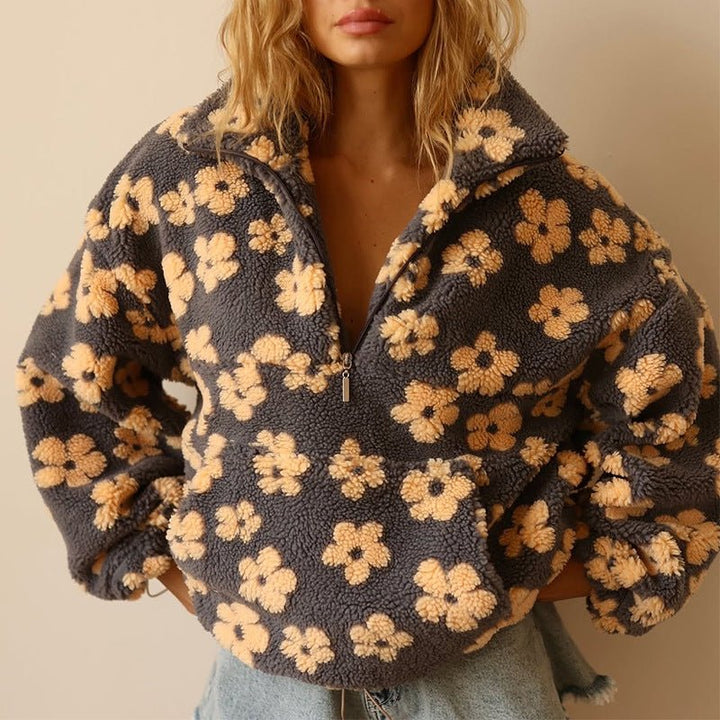 Lieve | Oversized teddyfleecejas met bloemenprint en halve ritssluiting
