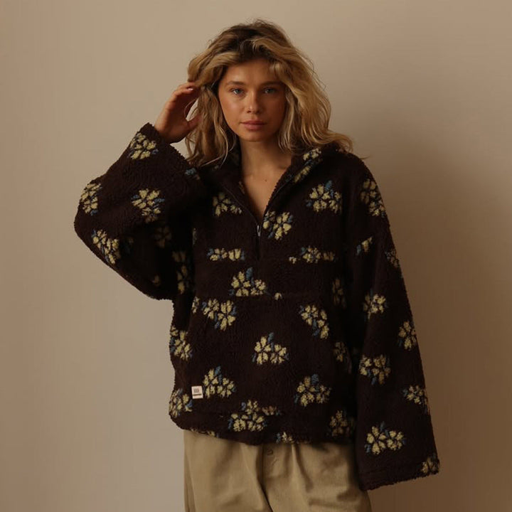 Lieve | Oversized teddyfleecejas met bloemenprint en halve ritssluiting